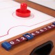 Close-up of the score counter on the 2 in 1 in/outdoor air hockey foosball game table, featuring a wooden finish.