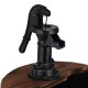 Close-up of the decorative hand pump on the 2-tiers outdoor wooden barrel waterfall fountain for garden decor.