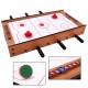 2 in 1 air hockey and foosball game table with rotating surfaces, includes pucks and cue sticks for indoor/outdoor fun.