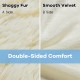 Double-sided throw blanket featuring shaggy fur and smooth velvet, 88 x 77 inches, perfect for cozying up on the sofa.