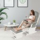 Light gray wood baby glider and ottoman set with padded armrests, perfect for relaxing in any room.