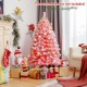 Pink 4.5 ft Christmas tree with snow flocked PVC tips and sturdy metal stand, perfect for festive room decor.