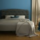 Faux linen headboard in dark gray with button detailing, adjustable heights for full size bed, adds elegance to any.