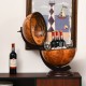 Tabletop globe wine cabinet in brown, featuring nautical map design, holds 3 wine bottles and glasses for stylish.