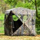 3-person portable pop-up hunting tent with camouflage design, gun ports, and carrying bag for outdoor use.