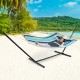 Colorful foldable patio hammock swing chair bed with detachable pillow, perfect for outdoor relaxation on the beach.