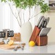 14-piece stainless steel kitchen knife set in a rubber wood block, including chef's, bread, and steak knives.