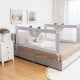 Vertical lifting gray baby bedrail guard with cute pattern, adjustable heights, and double safety lock for added child.