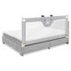 Vertical lifting baby bedrail guard in gray with cute pattern, adjustable height for safety on various mattress types.