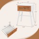 Mid-century modern rattan nightstand with a white finish, featuring a spacious drawer and solid wood legs for stability.