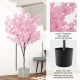 6.5 FT tall artificial cherry blossom tree with 900 pink flowers in a solid cement pot, perfect for indoor decoration.
