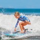 Lightweight boogie board with XPE deck and EPS core, perfect for kids riding waves at the beach.