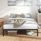 Queen size metal bed frame with heavy-duty support slats, minimalist design, and ample under-bed storage space.