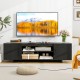 Black TV stand with power outlet, featuring 2 cable holes, open shelves, and side cabinets for organized media storage.