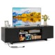 Black TV stand with power outlet, 60" tabletop, two cabinets, and open shelves for organized media storage.