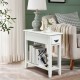 Narrow white 2-tier end table with drawer and lower shelf, made of P2 MDF and rubber wood, ideal for small spaces.