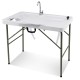 Fish cleaning table with two sinks, durable HDPE, and 360° rotating faucet for easy outdoor use and cleaning.
