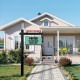 Black 6 feet vinyl UPVC real estate sign post with foreclosure notice, ideal for realtor yard displays and home sales.