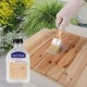Wood Wax Oil bottle with a brush applying clear oil on teak wood, ideal for restoring and protecting outdoor furniture.