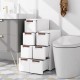 Three-drawer rolling storage cabinet in white with fluted surface, ideal for organizing towels and cosmetics in small.