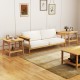 Boho bamboo sofa side table with faux rattan shelf, featuring elegant curves and 2-tier storage for living spaces.