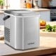 Countertop ice maker in silver, producing 9 bullet-shaped ice cubes in 6-13 mins, ideal for home and parties.