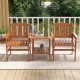 Two wooden chairs with slatted backs and a bistro table featuring umbrella holes, perfect for outdoor relaxation.