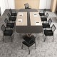 Black office guest chairs on wheels with metal frame and armrests, ideal for meetings and office use.