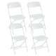 Four white metal folding chairs with plastic seats, designed for easy storage and suitable for various events.