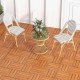 Interlocking deck tiles in brown, featuring a slatted design for drainage, perfect for outdoor patios and decks.