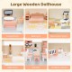 Wooden corner dollhouse playset featuring six rooms and 41 accessories, ideal for imaginative play and fine motor skill.