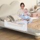 Foldable white bed rail with T-shaped legs and soft padding, providing safety for toddlers during sleep.