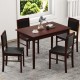 5-piece dining set featuring a brown veneered MDF table and four padded chairs with rubber wood legs for small dining.