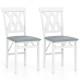 Set of 2 white folding wooden dining chairs with gray faux leather seats and X-shaped backrests, ideal for small spaces.