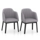 Set of 2 grey upholstered velvet accent dining chairs with curved backrests and sturdy rubber wood frames.