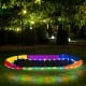 Colorful 60-inch saucer swing with LED lights, sturdy Oxford fabric seat, perfect for nighttime fun in the backyard.