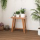Teak shower stool with solid wood legs, 18" height, ideal as a side table or plant stand for versatile use.
