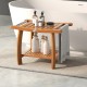 Teak wood shower bench with curved seat, double-layer shelf, and stainless steel handles, perfect for bathroom storage.