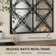 Arched window pane mirror with a brushed matte metal frame, ideal for brightening living rooms and bedrooms.