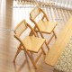 Curved backrest and wide seat of rattan cane folding dining chairs set of 2 for optimal comfort and support.