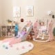 Kids enjoying the 4-in-1 pink slide and swing set with basketball hoop, perfect for playrooms and nurseries.