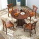 Round walnut dining table with pedestal base and four chairs, perfect for family meals in kitchens or dining rooms.