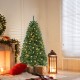 Artificial Christmas tree with warm white LED lights, featuring dense branch tips, perfect for holiday decoration.