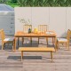 Rectangular acacia wood dining table for 6 with natural finish, perfect for outdoor gatherings on the patio.