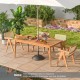 Rectangular 6-person outdoor dining table made of solid acacia wood, perfect for patio gatherings with an umbrella hole.