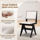 Plush padded seat and back of a swivel wooden dining chair in white faux sherpa fabric for stylish comfort.