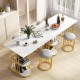 Rectangular dining table with faux marble surface and gold metal frame, featuring upholstered stools for small space.