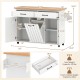 Mobile kitchen island table in white with trash bag storage, adjustable shelves, and lockable wheels for dining room.