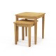 Nesting tables made of premium teak wood, showcasing natural texture, perfect for outdoor patio or indoor use.