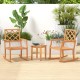 Oversized teak wood rocking chairs with slatted seats and backrests, perfect for outdoor relaxation on the porch.
